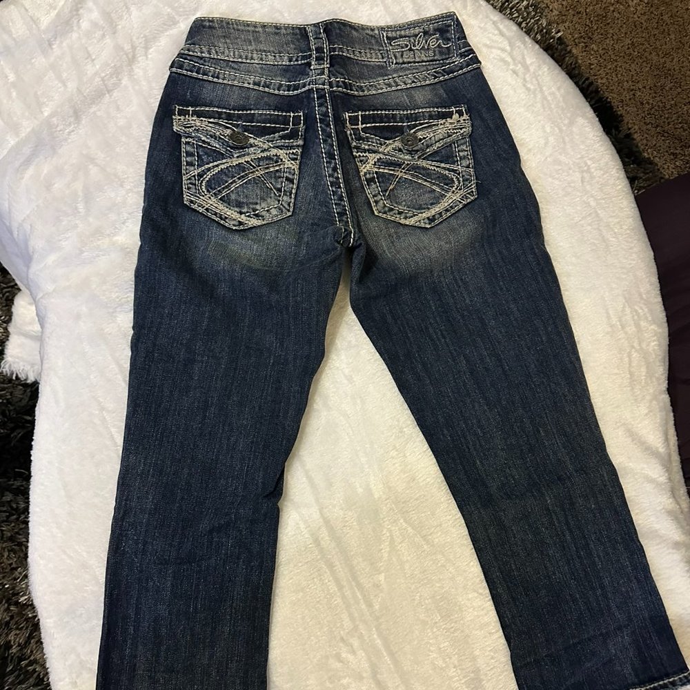 Sold Silver Jeans,  slightly distressed denim capris